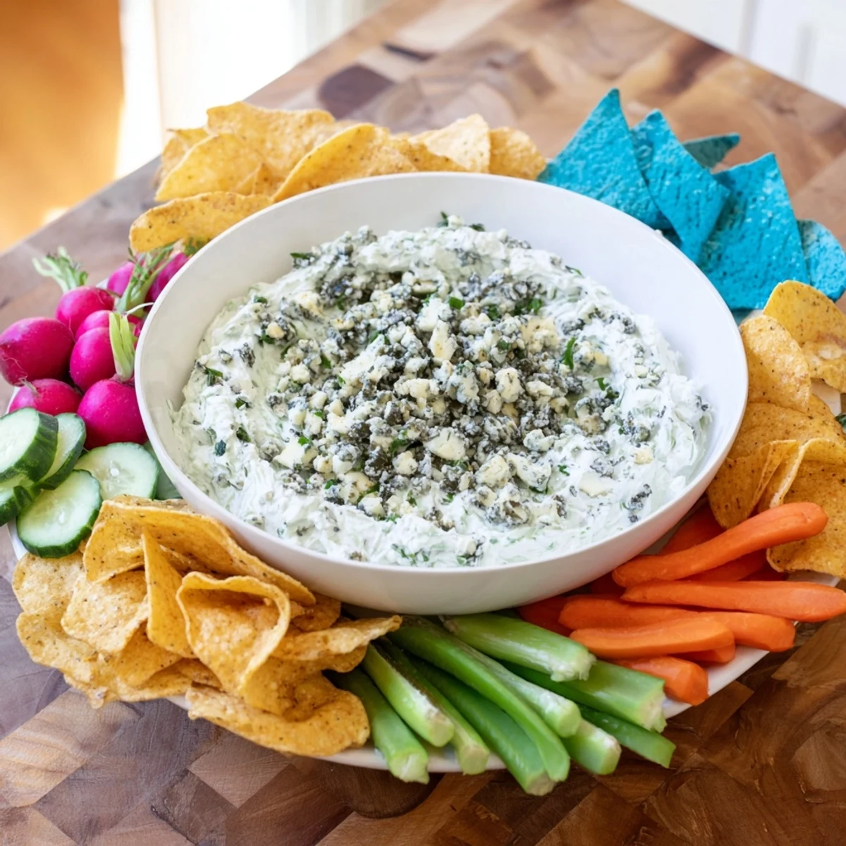Frozen Pond Blue Dip Platter, a visually stunning appetizer, ready to serve with chips and fresh veggies.