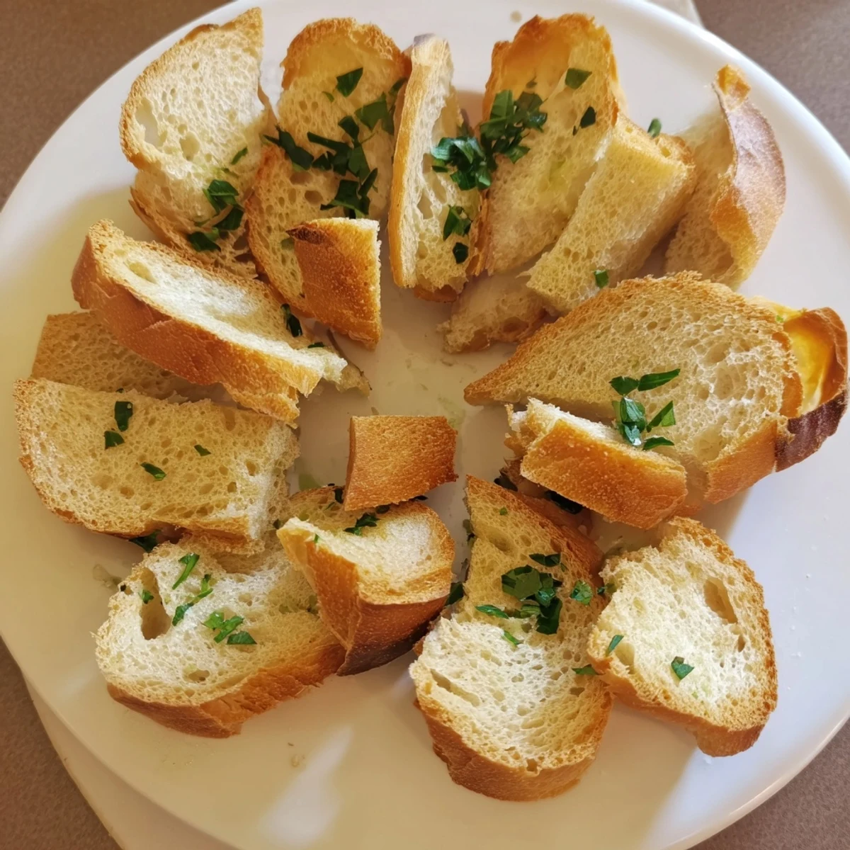 Appetizing overhead shot shows the Simple Bread baguette, a perfect appetizer for sharing at dinner.