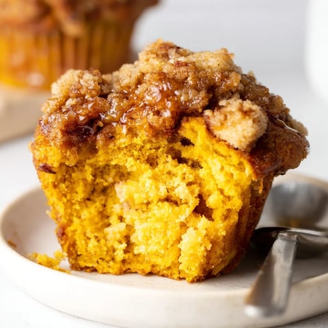 Moist French Toast Pumpkin Muffins topped with crunchy streusel for a cozy breakfast.  