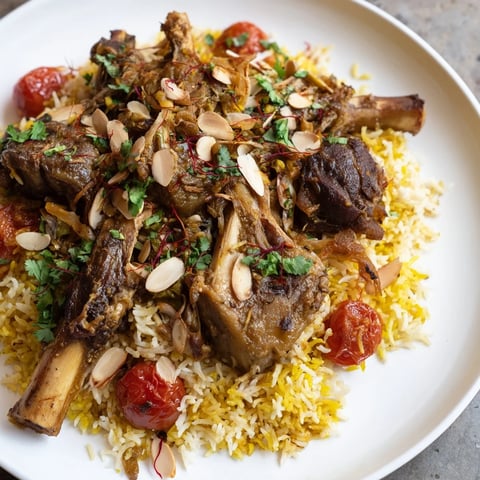 Tender lamb and fluffy rice: a photo of delicious Qatari Majboos, ready to serve.
