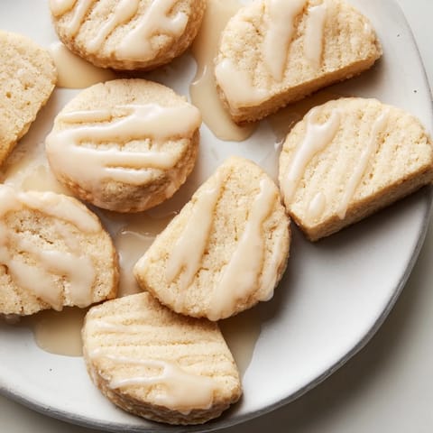 Delicate Sablé Cookies topped with vibrant soda float drizzle, perfect for dessert lovers.  