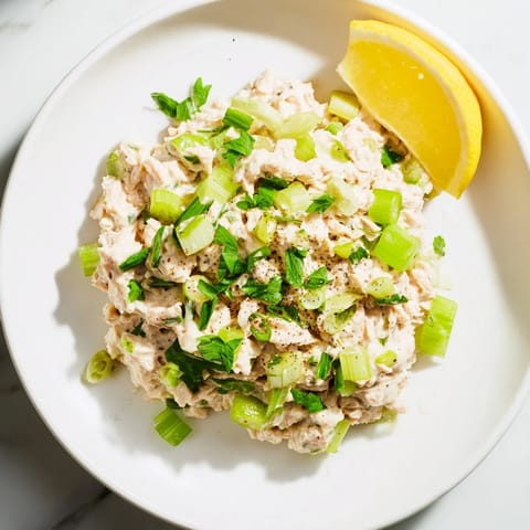 This zesty Spicy Zesty Tuna Salad displays tender tuna, mixed with a spicy mayo dressing, perfect for lunch.