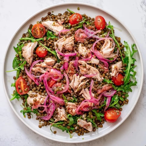 Vibrant Lentil & Chicken Spring Salad bursting with flavor, showcasing tender lentils and roasted chicken.